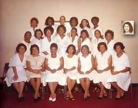 The chartering members of Mu Upsilon Omega Chapter gathered for a formal group portrait